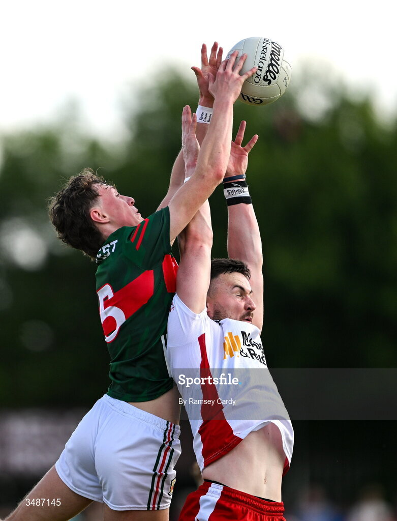 14 June 2026; Peter Teague of Tyrone and Kobe McDonald of Mayo during the GAA Football All-Ireland Senior Championship Round 2A match between Tyrone and Mayo at O’Neills Healy Park in Omagh, Tyrone. Photo by Ramsey Cardy/Sportsfile
