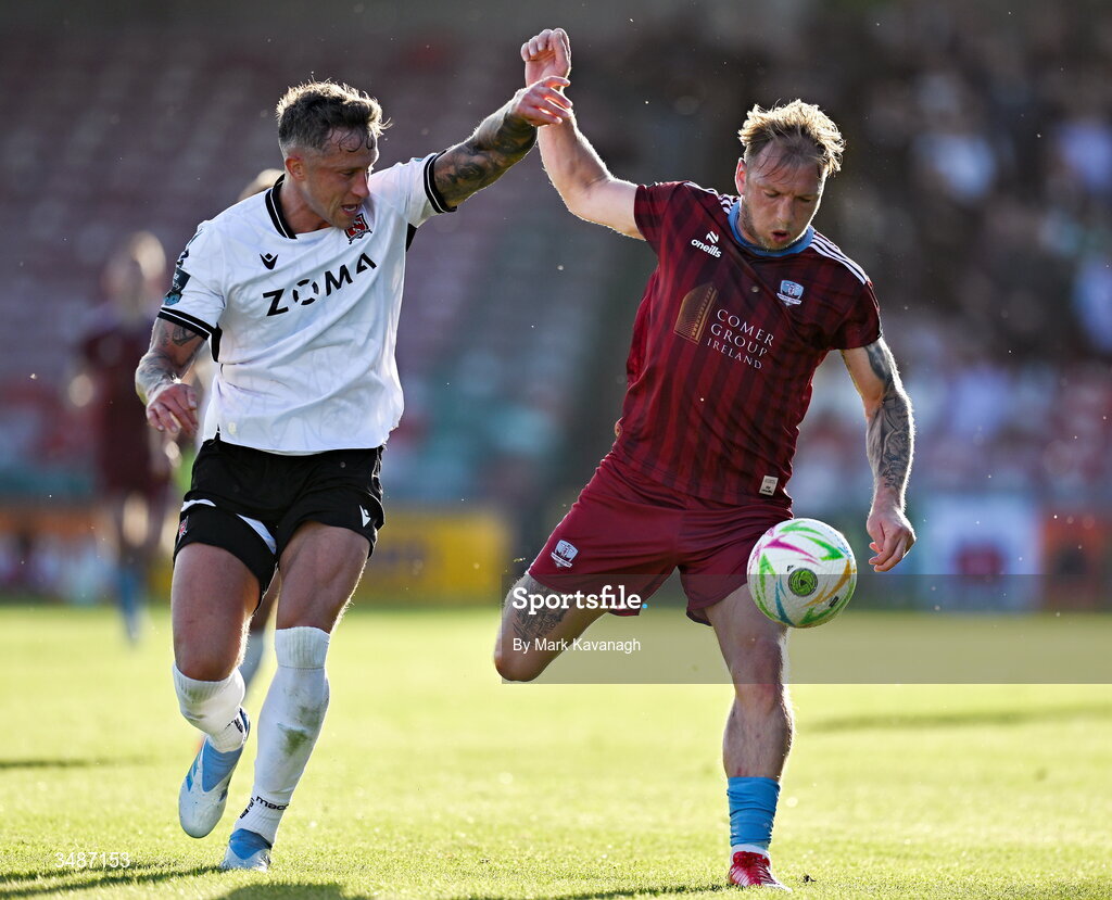 12 June 2026; Stephen Walsh of Galway United in action against Rob Cornwall of Dundalk during the SSE Airtricity Men’s Premier Division match between Galway United and Dundalk at Turner's Cross Stadium in Cork. Photo by Mark Kavanagh/Sportsfile