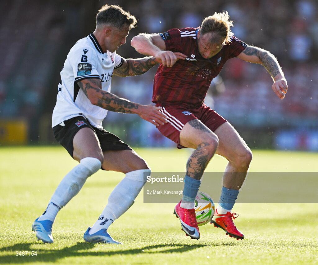 12 June 2026; Stephen Walsh of Galway United in action against Rob Cornwall of Dundalk during the SSE Airtricity Men’s Premier Division match between Galway United and Dundalk at Turner's Cross Stadium in Cork. Photo by Mark Kavanagh/Sportsfile