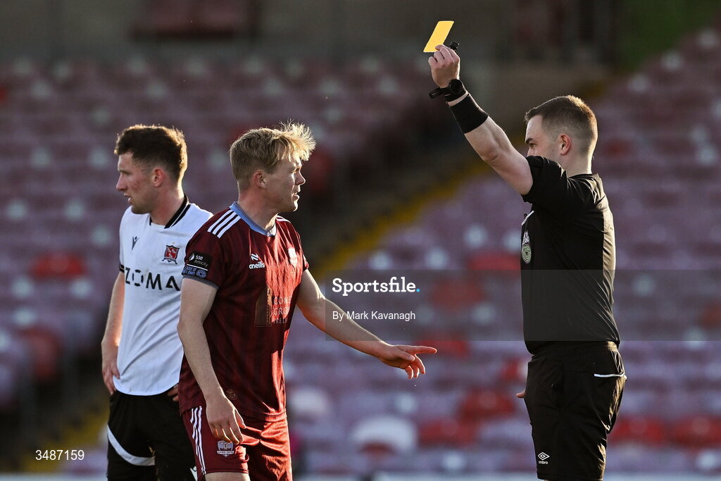 12 June 2026; Conor McCormack of Galway United receives a yellow card  from referee Kevin O’Sullivan during the SSE Airtricity Men’s Premier Division match between Galway United and Dundalk at Turner's Cross Stadium in Cork. Photo by Mark Kavanagh/Sportsfile