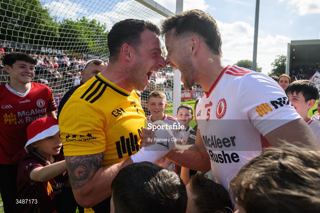 14 June 2026; Tyrone players Niall Morgan, left, and Michael McKernan celebrate after the GAA Football All-Ireland Senior Championship Round 2A match between Tyrone and Mayo at O’Neills Healy Park in Omagh, Tyrone. Photo by Ramsey Cardy/Sportsfile