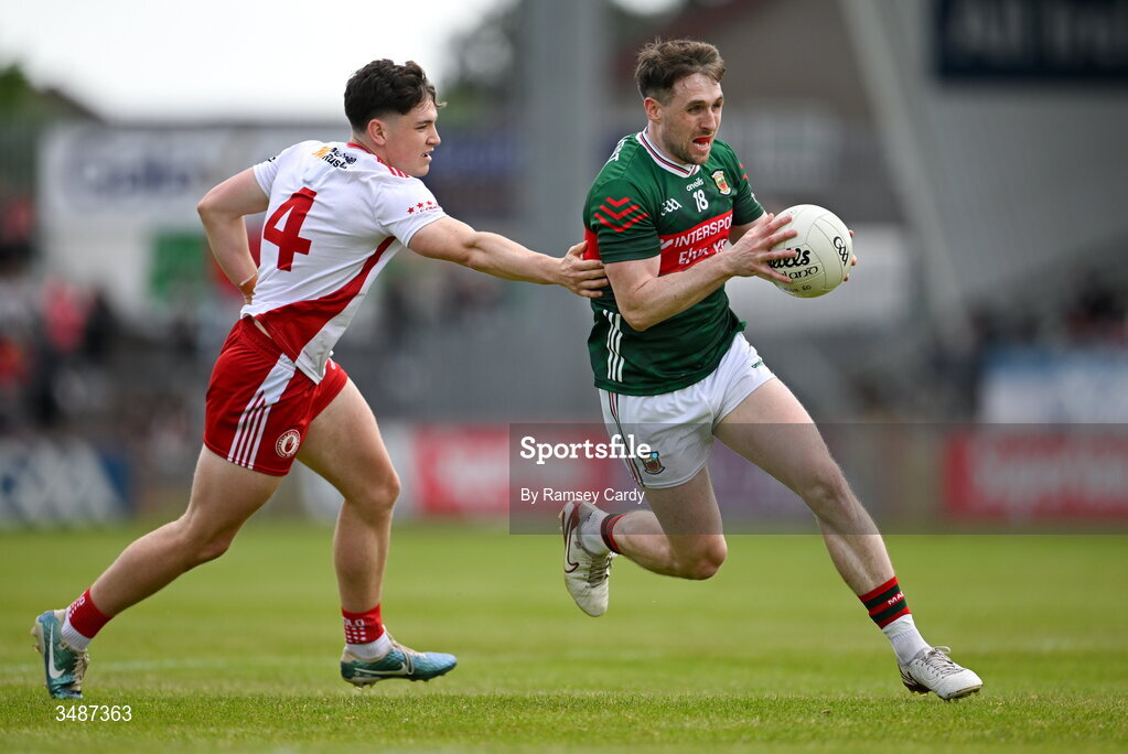 14 June 2026; Paddy Durcan of Mayo in action against Joey Clarke of Tyrone during the GAA Football All-Ireland Senior Championship Round 2A match between Tyrone and Mayo at O’Neills Healy Park in Omagh, Tyrone. Photo by Ramsey Cardy/Sportsfile