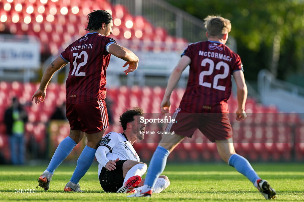 12 June 2026; Danny Mullen of Dundalk reacts after being tackled by Gianfranco Facchineri of Galway United, left, during the SSE Airtricity Men’s Premier Division match between Galway United and Dundalk at Turner's Cross Stadium in Cork. Photo by Mark Kavanagh/Sportsfile