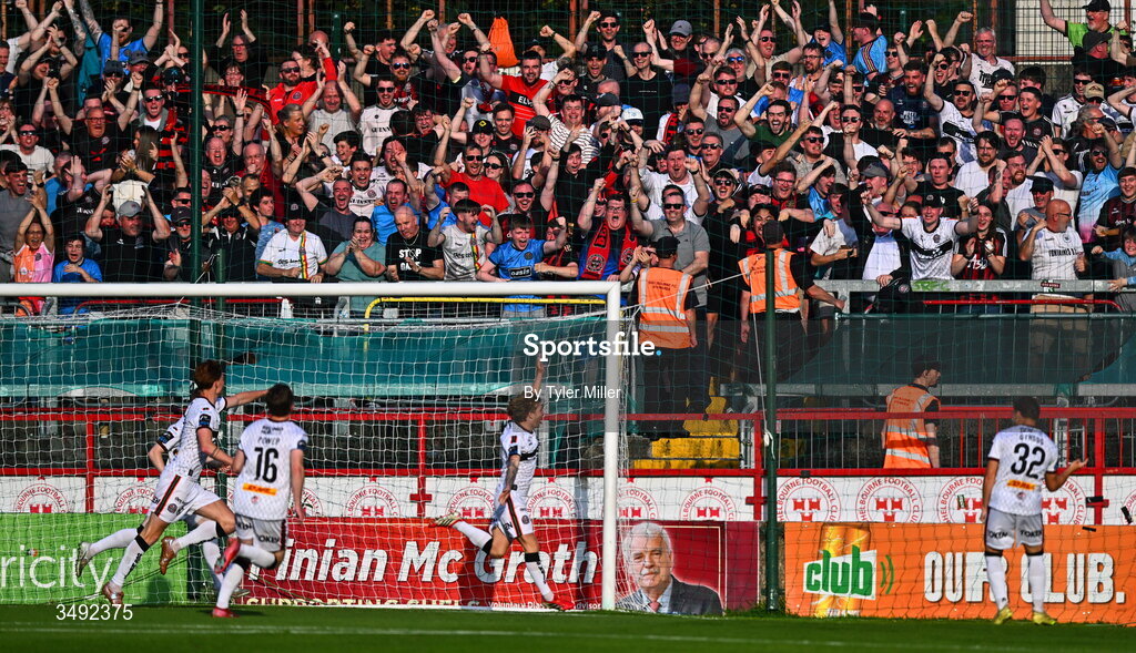 22 June 2026; Bohemians supporters celebrate after Harry Vaughan, bottom centre, scored their side's first goal during the SSE Airtricity Men’s Premier Division match between Shelbourne and Bohemians at Tolka Park in Dublin. Photo by Tyler Miller/Sportsfile