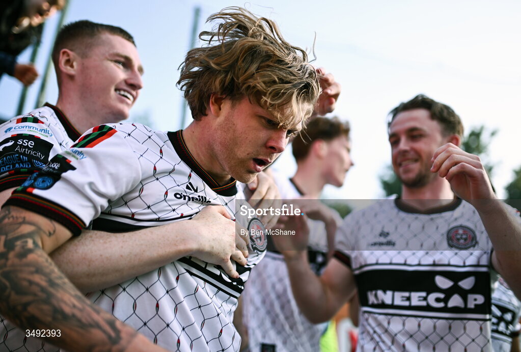 22 June 2026; Harry Vaughan of Bohemians, centre, celebrates with teammates, including Ross Tierney, left, and Darragh Power, after scoring their side's first goal during the SSE Airtricity Men’s Premier Division match between Shelbourne and Bohemians at Tolka Park in Dublin. Photo by Ben McShane/Sportsfile