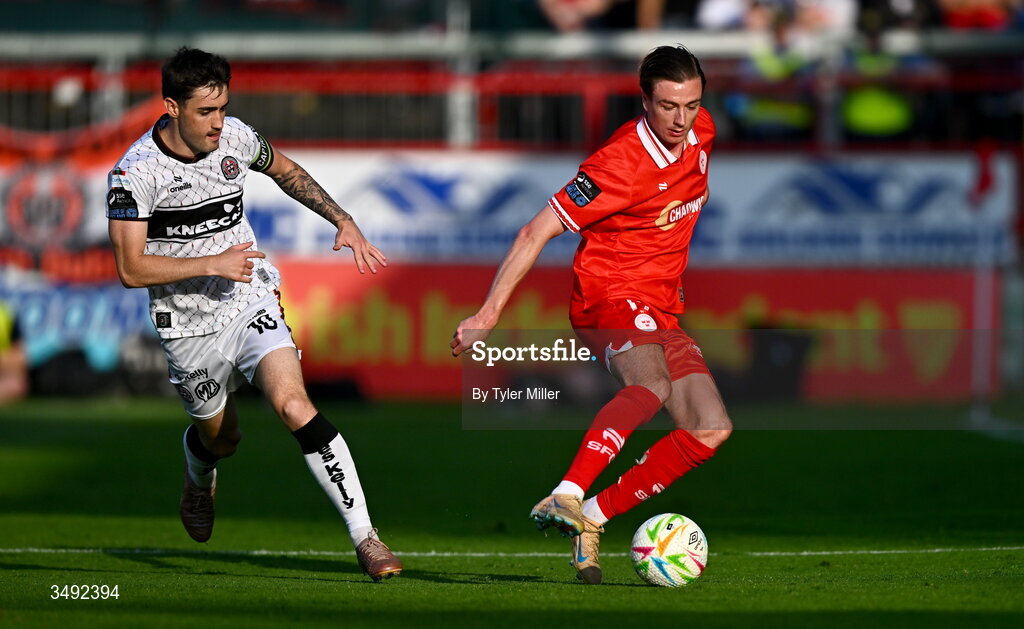22 June 2026; Daniel Kelly of Shelbourne in action against Dawson Devoy of Bohemians during the SSE Airtricity Men’s Premier Division match between Shelbourne and Bohemians at Tolka Park in Dublin. Photo by Tyler Miller/Sportsfile