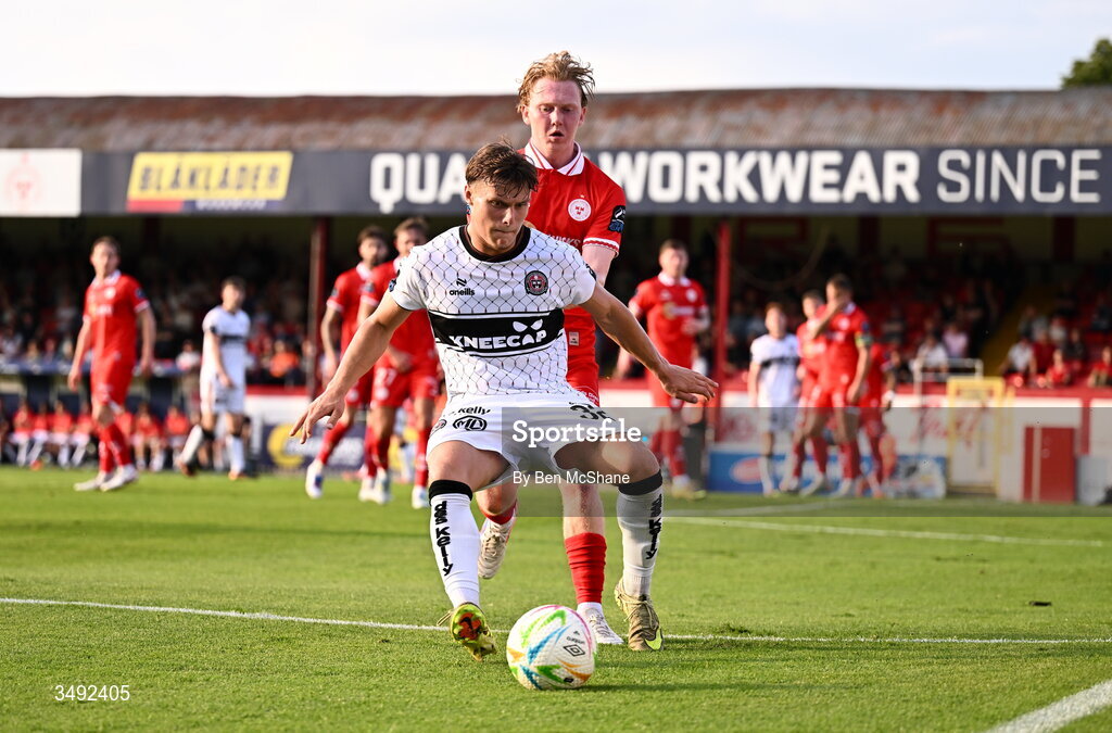 22 June 2026; Markuss Strods of Bohemians in action against Jack Henry-Francis of Shelbourne during the SSE Airtricity Men’s Premier Division match between Shelbourne and Bohemians at Tolka Park in Dublin. Photo by Ben McShane/Sportsfile