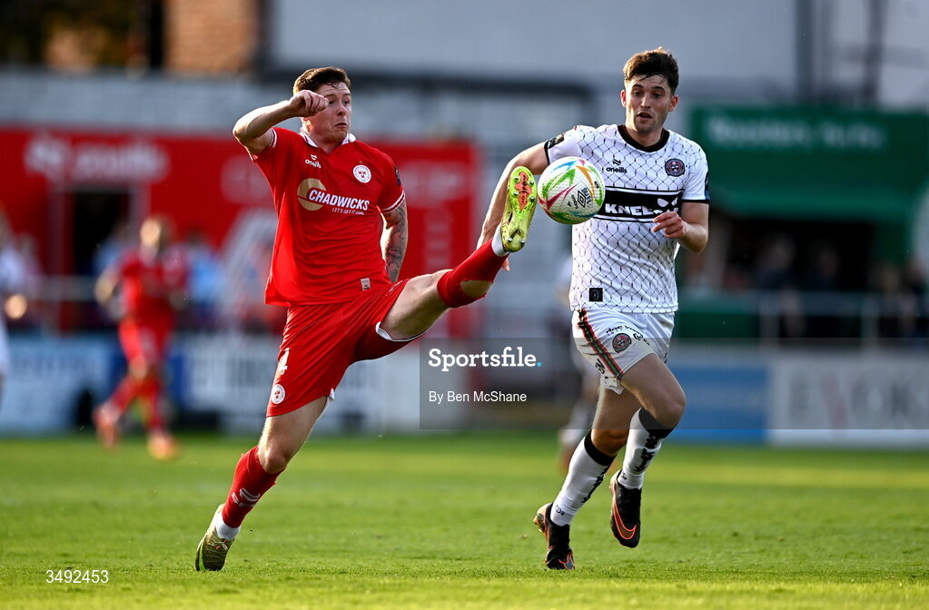 22 June 2026; Kameron Ledwidge of Shelbourne in action against Colm Whelan of Bohemians  during the SSE Airtricity Men’s Premier Division match between Shelbourne and Bohemians at Tolka Park in Dublin. Photo by Ben McShane/Sportsfile