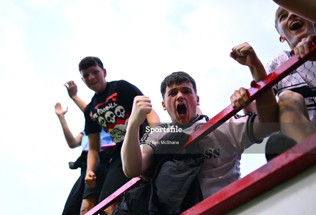 22 June 2026; Bohemians supporters celebrate after their side's third goal, scored by Ross Tierney, not pictured, during the SSE Airtricity Men’s Premier Division match between Shelbourne and Bohemians at Tolka Park in Dublin. Photo by Ben McShane/Sportsfile