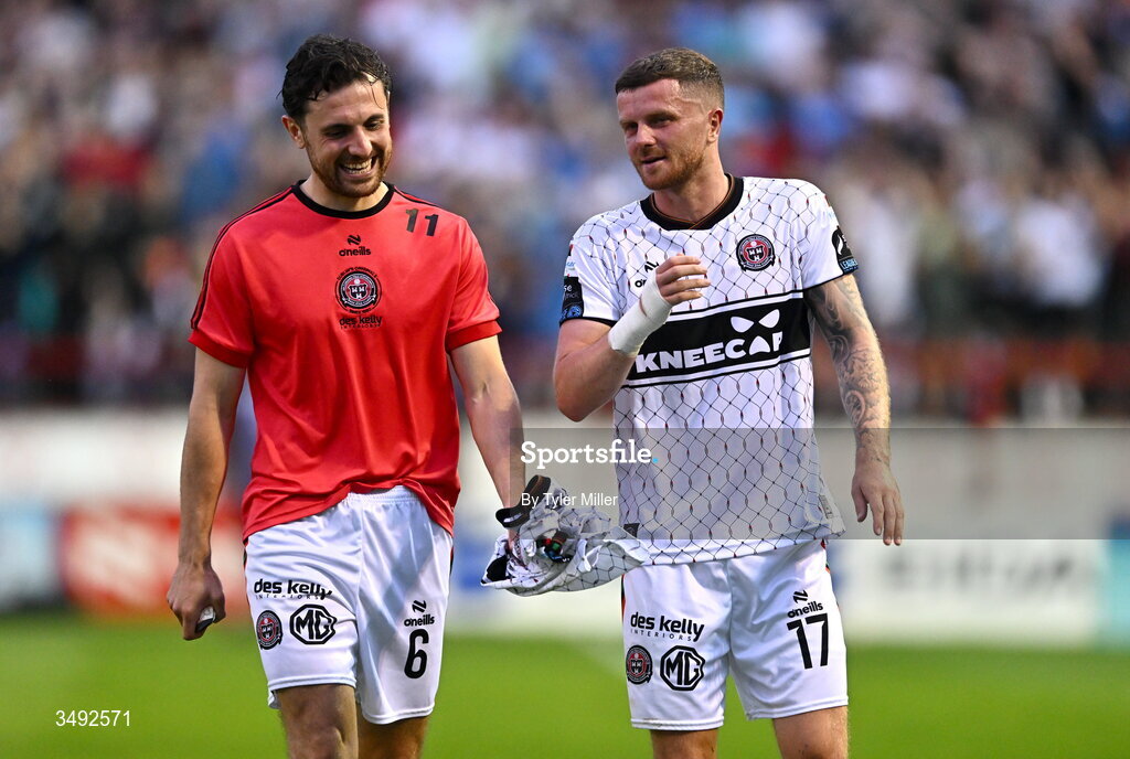22 June 2026; Jordan Flores, left, and Adam McDonnell of Bohemians after the SSE Airtricity Men’s Premier Division match between Shelbourne and Bohemians at Tolka Park in Dublin. Photo by Tyler Miller/Sportsfile