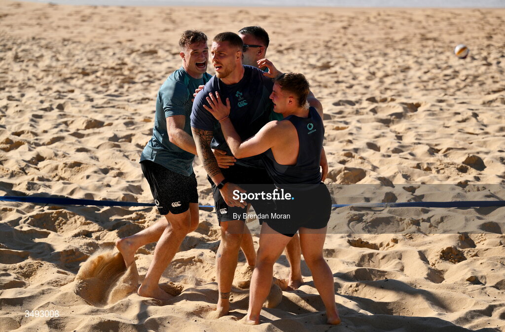 24 June 2026; Ireland rugby squad members Josh van der Flier, Sean Jansen and Craig Casey and assistant coach Jonathan Sexton as the squad relaxed with a game of beach volleyball on Manly Beach in Sydney, Australia. Photo by Brendan Moran/Sportsfile