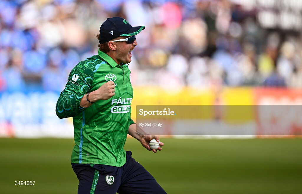 26 June 2026; Ireland fielder Ben Calitz celebrates after taking the wicket of India batter Washington Sundar during match one of the Spinny Cup Men's T20 International series between Ireland and India at Stormont in Belfast. Photo by Seb Daly/Sportsfile
