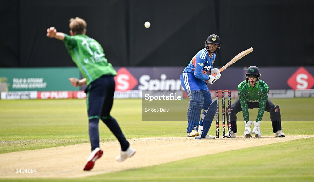 26 June 2026; India batter Abhishek Sharma, plays a shot, watched by Ireland wicketkeeper Lorcan Tucker, during match one of the Spinny Cup Men's T20 International series between Ireland and India at Stormont in Belfast. Photo by Seb Daly/Sportsfile