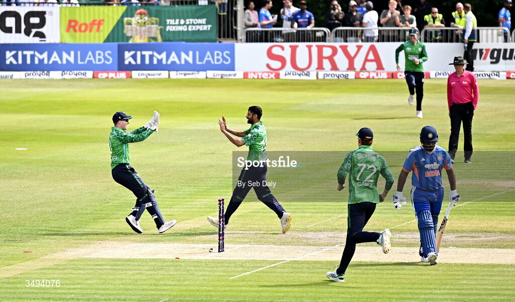 26 June 2026; Ireland bowler Jai Moondra celebrates with wicketkeeper Lorcan Tucker after taking the wicket of India batter Sanju Samson during match one of the Spinny Cup Men's T20 International series between Ireland and India at Stormont in Belfast. Photo by Seb Daly/Sportsfile