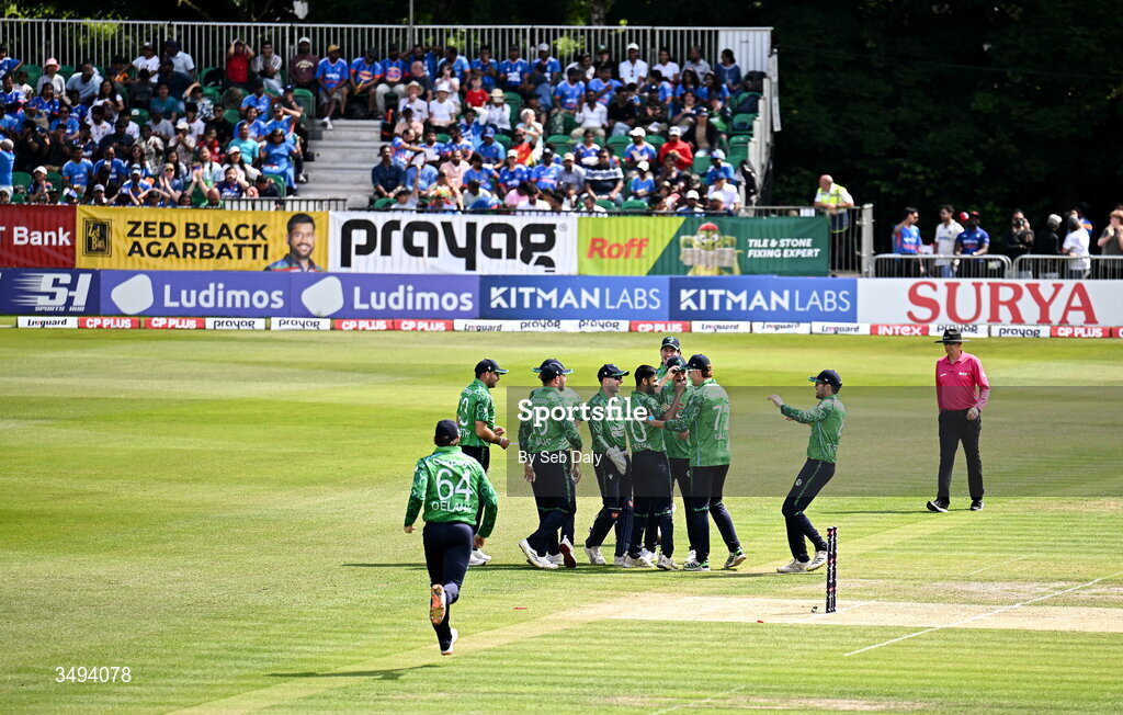 26 June 2026; Ireland players celebrate a wicket during match one of the Spinny Cup Men's T20 International series between Ireland and India at Stormont in Belfast. Photo by Seb Daly/Sportsfile