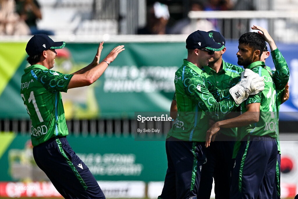26 June 2026; Ireland bowler Jai Moondra, right, is congratulated by teammates after taking the wicket of India batter Shivam Dube during match one of the Spinny Cup Men's T20 International series between Ireland and India at Stormont in Belfast. Photo by Seb Daly/Sportsfile