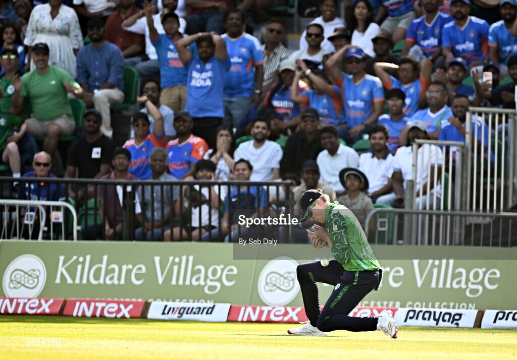 26 June 2026; Ireland fielder Harry Tector drops a catch on the boundary during match one of the Spinny Cup Men's T20 International series between Ireland and India at Stormont in Belfast. Photo by Seb Daly/Sportsfile