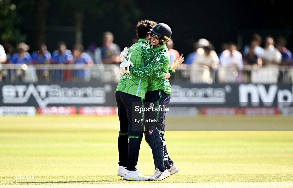 26 June 2026; Ireland bowler Matthew Humphreys, left, is congratulated by teammate Lorcan Tucker after taking the wicket of India batter Harshit Rana during match one of the Spinny Cup Men's T20 International series between Ireland and India at Stormont in Belfast. Photo by Seb Daly/Sportsfile