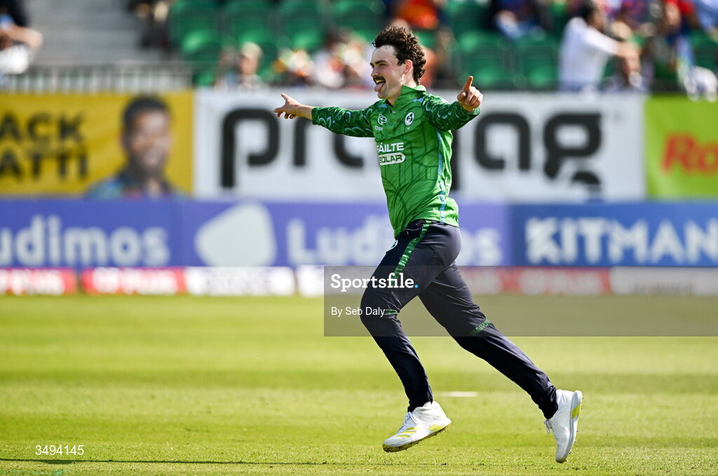 26 June 2026; Ireland's Matthew Humphreys celebrates the fall of the last India wicket during match one of the Spinny Cup Men's T20 International series between Ireland and India at Stormont in Belfast. Photo by Seb Daly/Sportsfile
