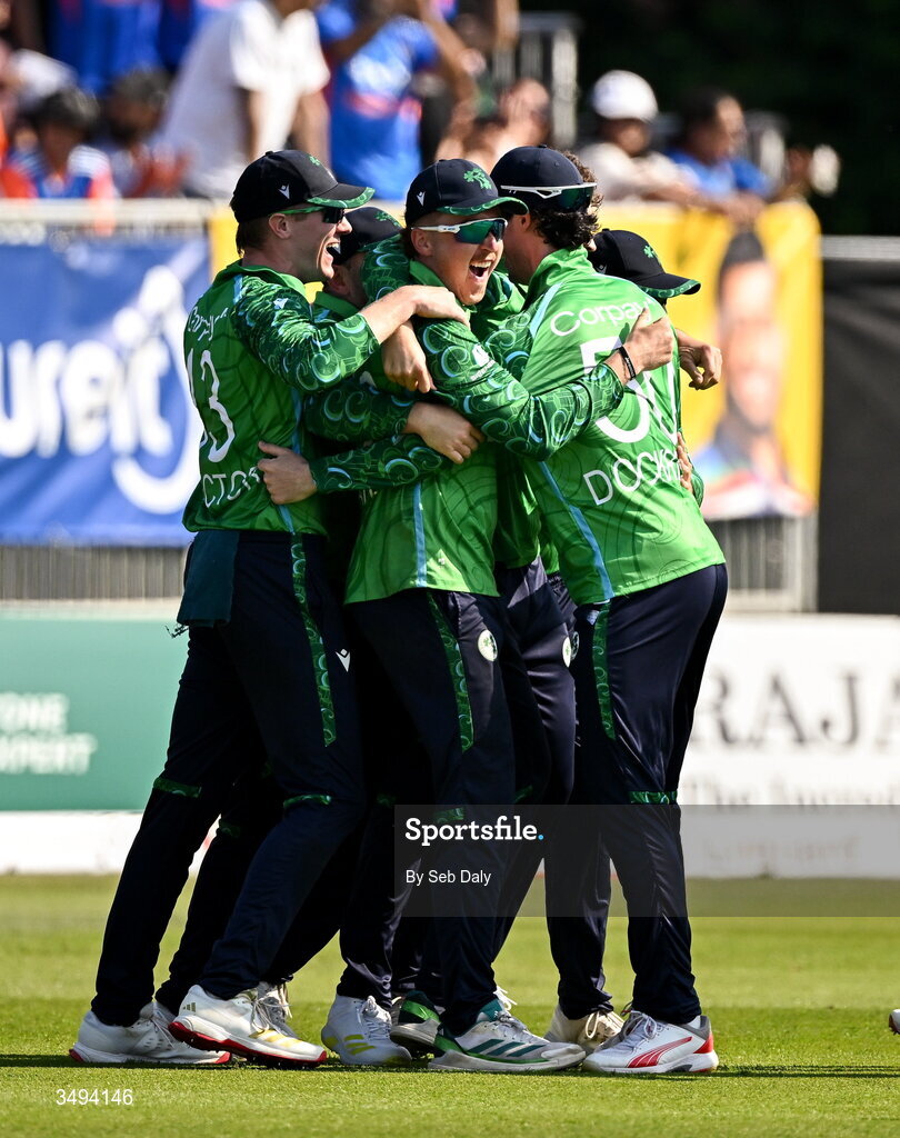 26 June 2026; Ireland players celebrate after their side's victory during match one of the Spinny Cup Men's T20 International series between Ireland and India at Stormont in Belfast. Photo by Seb Daly/Sportsfile