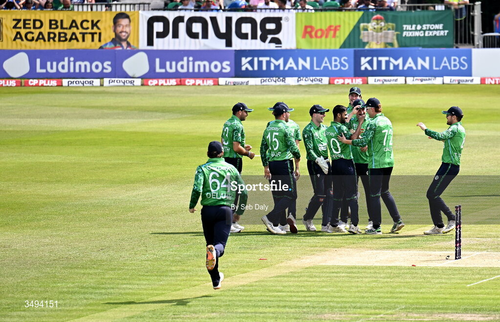 26 June 2026; Ireland bowler Jai Moondra is congratulated by teammates after taking a wicket during match one of the Spinny Cup Men's T20 International series between Ireland and India at Stormont in Belfast. Photo by Seb Daly/Sportsfile