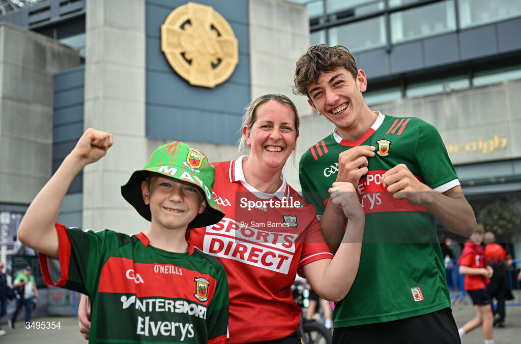 27 June 2026; Cork supporter Iseult Mangan, with her Mayo supporting sons, Senan Mangan, aged 8, and Cian Mangan, aged 17, from Hollymount, Mayo, before the GAA Football All-Ireland Senior Championship quarter-final match between Cork and Mayo at Croke Park in Dublin.  Photo by Sam Barnes/Sportsfile