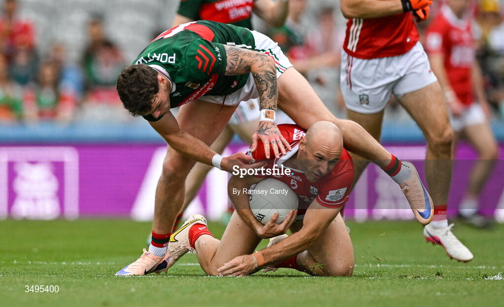 27 June 2026; Brian O'Driscoll of Cork in action against Jordan Flynn of Mayo during the GAA Football All-Ireland Senior Championship quarter-final match between Cork and Mayo at Croke Park in Dublin. Photo by Ramsey Cardy/Sportsfile