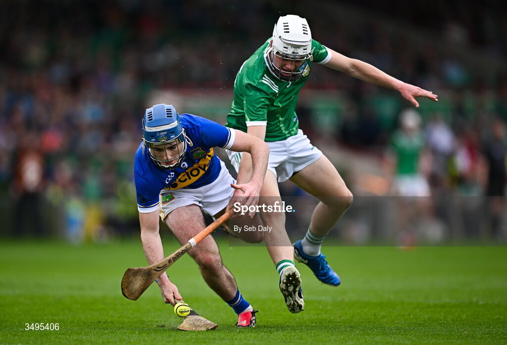 27 June 2026; Hugo Healy of Tipperary in action against John O'Riordan of Limerick during the Electric Ireland All-Ireland Minor Hurling Championship final match between Limerick and Tipperary at TUS Gaelic Grounds in Limerick. Photo by Seb Daly/Sportsfile