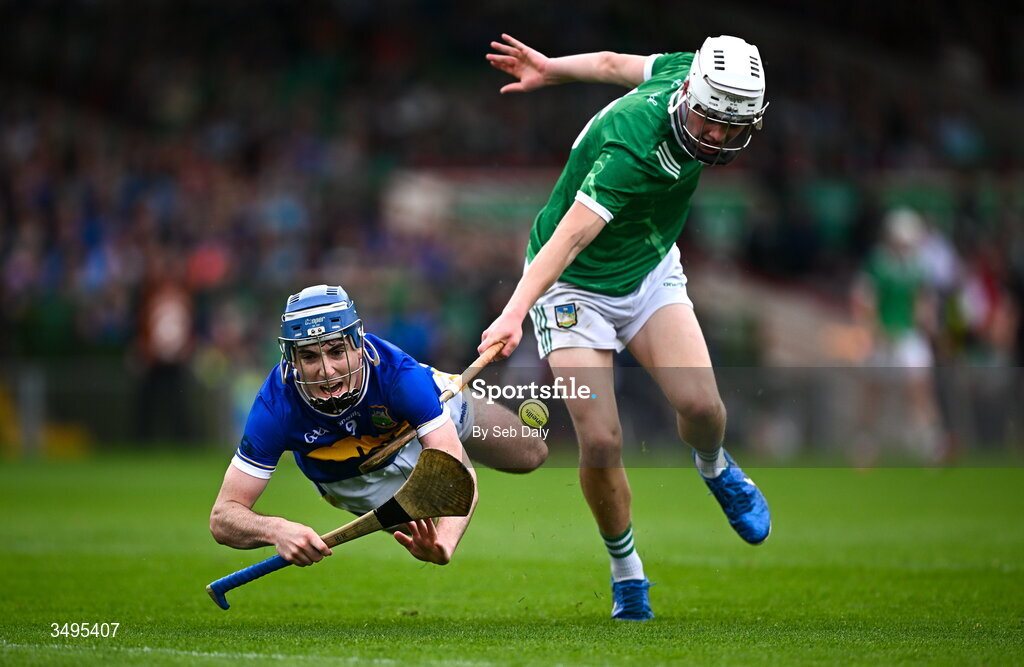 27 June 2026; Hugo Healy of Tipperary in action against John O'Riordan of Limerick during the Electric Ireland All-Ireland Minor Hurling Championship final match between Limerick and Tipperary at TUS Gaelic Grounds in Limerick. Photo by Seb Daly/Sportsfile