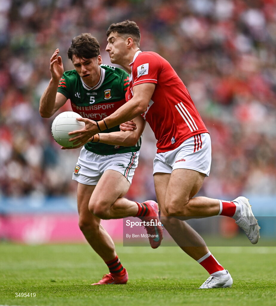 27 June 2026; Seán McDonnell of Cork in action against Sam Callinan of Mayo during the GAA Football All-Ireland Senior Championship quarter-final match between Cork and Mayo at Croke Park in Dublin. Photo by Ben McShane/Sportsfile