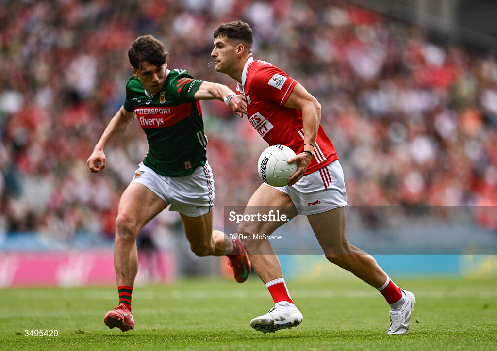 27 June 2026; Seán McDonnell of Cork in action against Sam Callinan of Mayo during the GAA Football All-Ireland Senior Championship quarter-final match between Cork and Mayo at Croke Park in Dublin. Photo by Ben McShane/Sportsfile