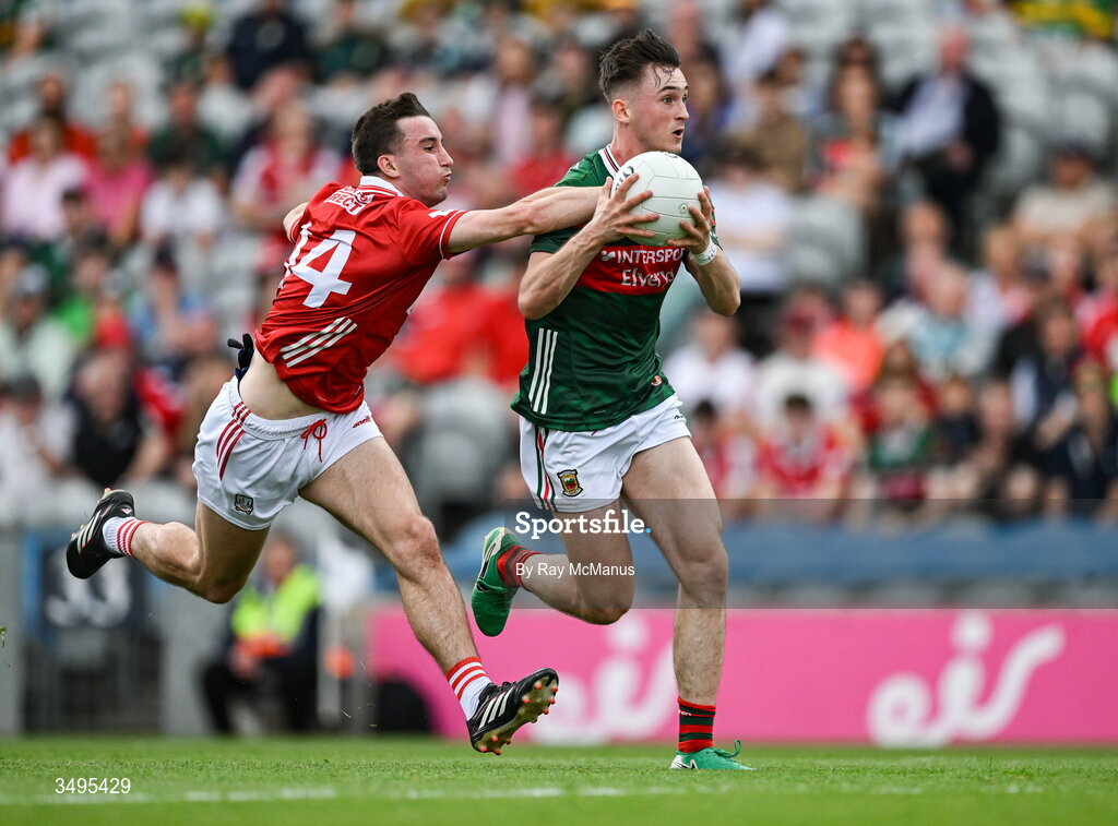 27 June 2026; Eoin McGreal of Mayo is tackled by Chris Óg Jones of Cork during the GAA Football All-Ireland Senior Championship quarter-final match between Cork and Mayo at Croke Park in Dublin. Photo by Ray McManus/Sportsfile