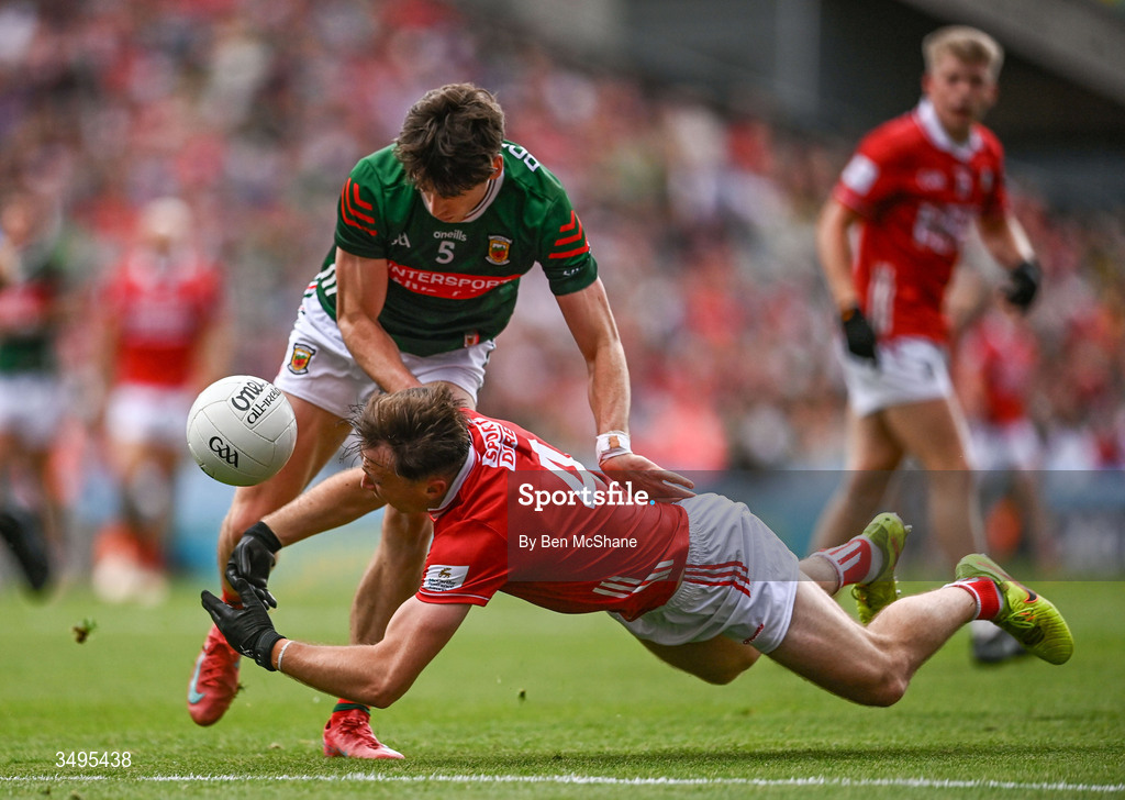 27 June 2026; Seán Meehan of Cork is tackled by Sam Callinan of Mayo during the GAA Football All-Ireland Senior Championship quarter-final match between Cork and Mayo at Croke Park in Dublin. Photo by Ben McShane/Sportsfile