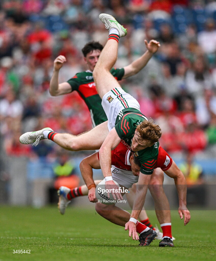 27 June 2026; Jack Carney of Mayo and Colm O'Callaghan of Cork during the GAA Football All-Ireland Senior Championship quarter-final match between Cork and Mayo at Croke Park in Dublin. Photo by Ramsey Cardy/Sportsfile
