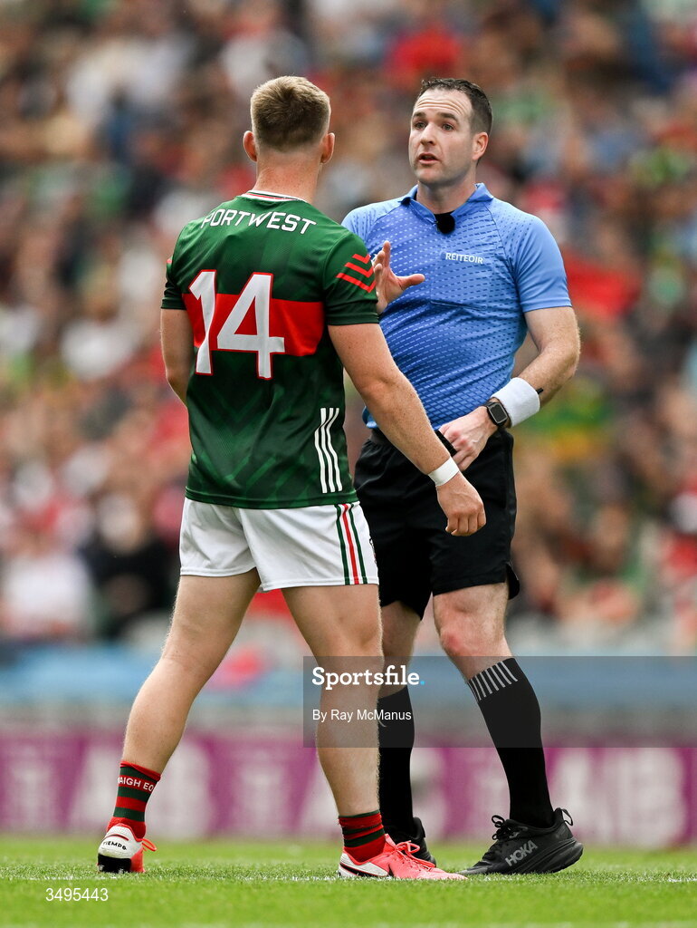 27 June 2026; Referee Martin McNally speaks to Ryan O'Donoghue of Mayo during the first half of the GAA Football All-Ireland Senior Championship quarter-final match between Cork and Mayo at Croke Park in Dublin. Photo by Ray McManus/Sportsfile