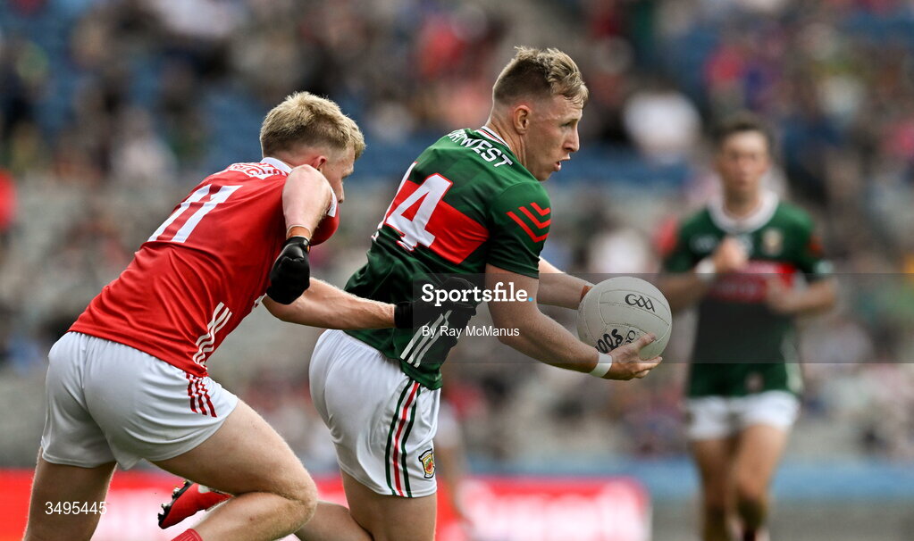 27 June 2026; Ryan O'Donoghue of Mayo in action against Seán Meehan of Cork during the GAA Football All-Ireland Senior Championship quarter-final match between Cork and Mayo at Croke Park in Dublin. Photo by Ray McManus/Sportsfile