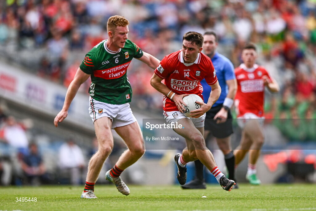 27 June 2026; Chris Óg Jones of Cork is tackled by David McBrien of Mayo during the GAA Football All-Ireland Senior Championship quarter-final match between Cork and Mayo at Croke Park in Dublin. Photo by Ben McShane/Sportsfile