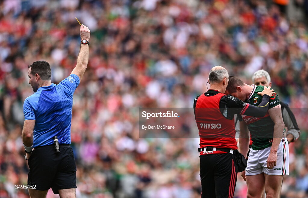 27 June 2026; Stephen Coen of Mayo receives a yellow card from Stephen Coen of Mayo during the GAA Football All-Ireland Senior Championship quarter-final match between Cork and Mayo at Croke Park in Dublin. Photo by Ben McShane/Sportsfile