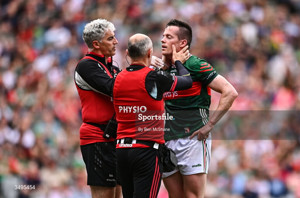 27 June 2026; Stephen Coen of Mayo receives medical attention during the GAA Football All-Ireland Senior Championship quarter-final match between Cork and Mayo at Croke Park in Dublin. Photo by Ben McShane/Sportsfile