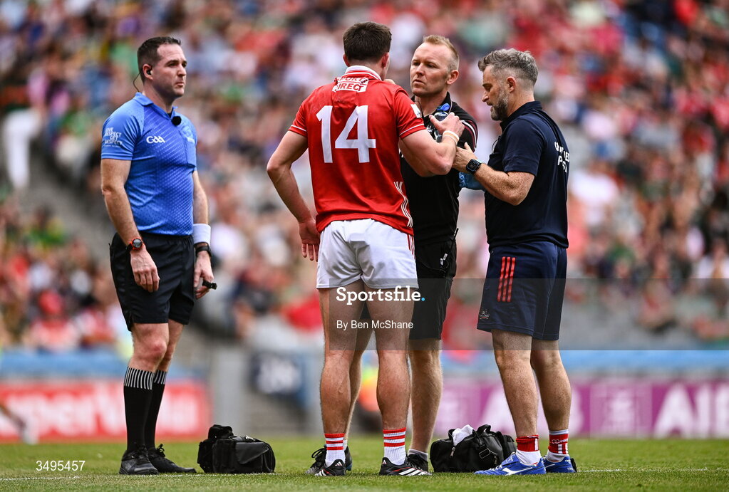 27 June 2026; Chris Óg Jones of Cork receives medical attention during the GAA Football All-Ireland Senior Championship quarter-final match between Cork and Mayo at Croke Park in Dublin. Photo by Ben McShane/Sportsfile