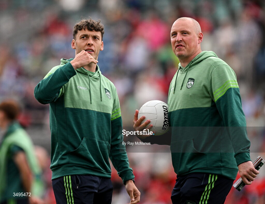 27 June 2026; Kerry coach Kieran Donaghy and David Clifford of Kerry discuss the direction of the wind as they walk the pitch in advance of the GAA Football All-Ireland Senior Championship quarter-final match between Kerry and Tyrone at Croke Park in Dublin. Photo by Ray McManus/Sportsfile
