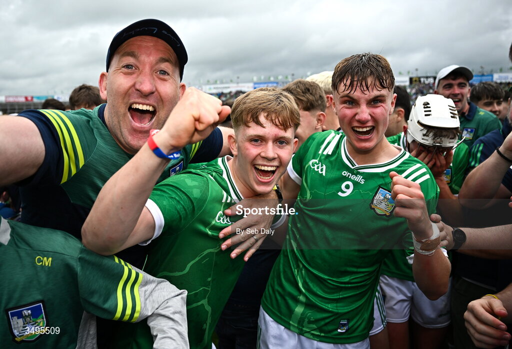27 June 2026; Limerick players, including Donagh Horgan, left, and John Ross O'Reilly, celebrate with supporters after their side's victory in the Electric Ireland All-Ireland Minor Hurling Championship final match between Limerick and Tipperary at TUS Gaelic Grounds in Limerick. Photo by Seb Daly/Sportsfile