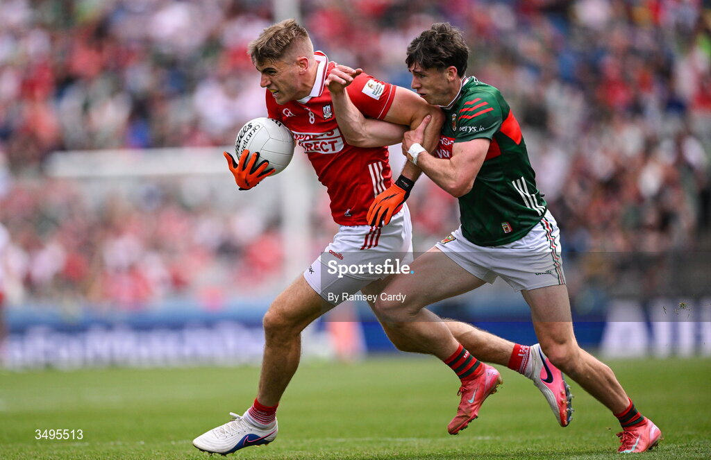 27 June 2026; Ian Maguire of Cork in action against Sam Callinan of Mayo during the GAA Football All-Ireland Senior Championship quarter-final match between Cork and Mayo at Croke Park in Dublin. Photo by Ramsey Cardy/Sportsfile