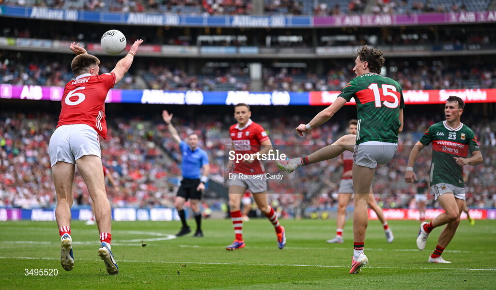 27 June 2026; Kobe McDonald of Mayo has a shot blocked by Tommy Walsh of Cork during the GAA Football All-Ireland Senior Championship quarter-final match between Cork and Mayo at Croke Park in Dublin. Photo by Ramsey Cardy/Sportsfile