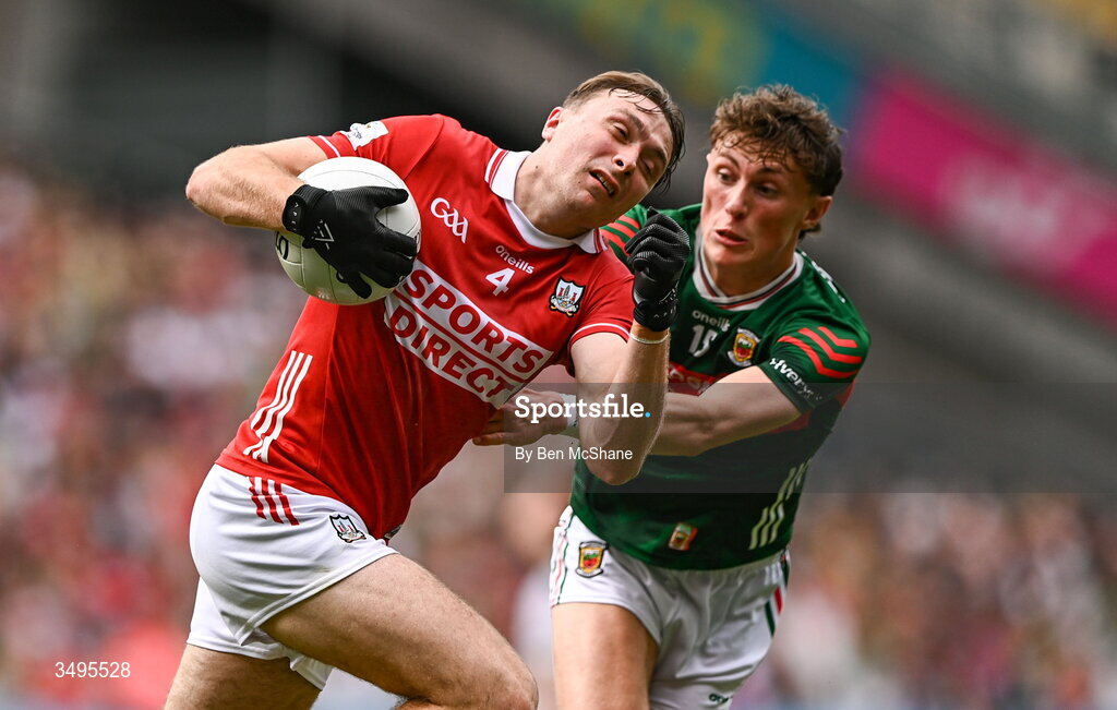 27 June 2026; Seán Meehan of Cork is tackled by Kobe McDonald of Mayo during the GAA Football All-Ireland Senior Championship quarter-final match between Cork and Mayo at Croke Park in Dublin. Photo by Ben McShane/Sportsfile