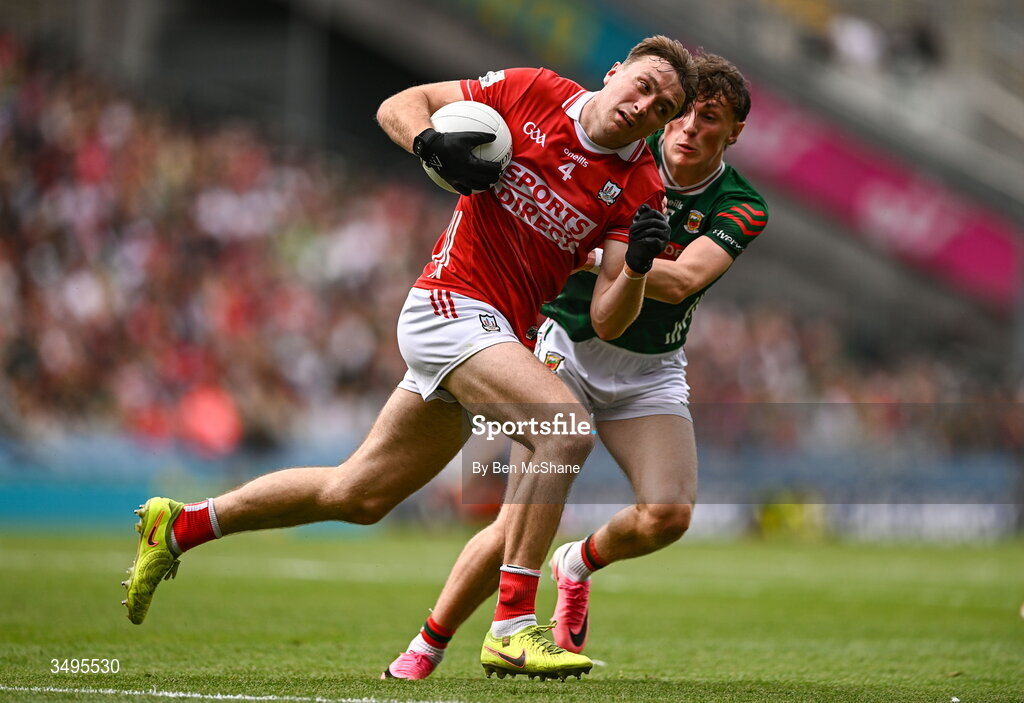 27 June 2026; Seán Meehan of Cork is tackled by Kobe McDonald of Mayo during the GAA Football All-Ireland Senior Championship quarter-final match between Cork and Mayo at Croke Park in Dublin. Photo by Ben McShane/Sportsfile