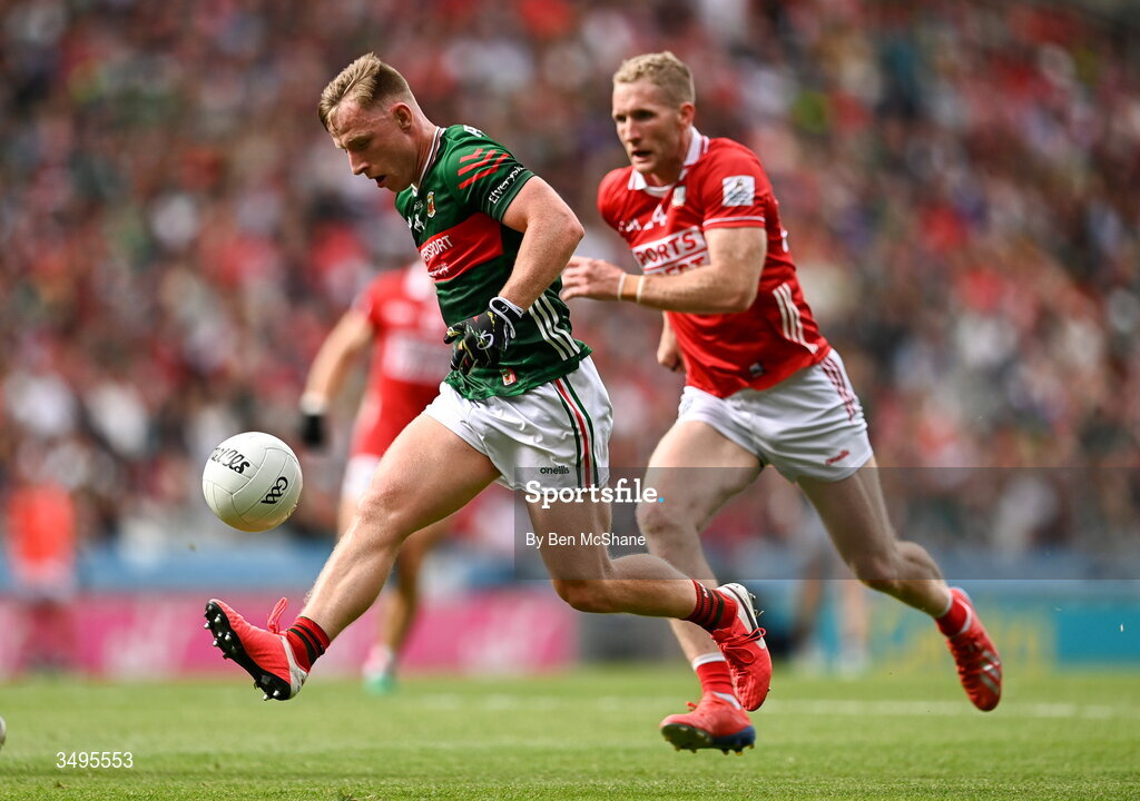 27 June 2026; Ryan O'Donoghue of Mayo in action against Ruairi Deane of Cork during the GAA Football All-Ireland Senior Championship quarter-final match between Cork and Mayo at Croke Park in Dublin. Photo by Ben McShane/Sportsfile