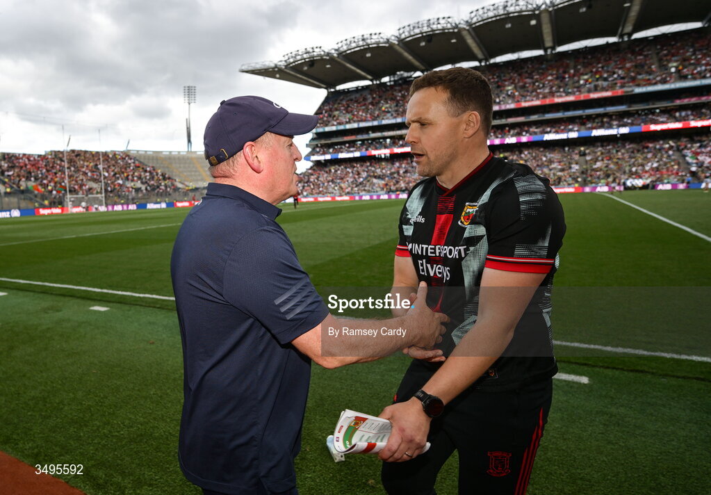27 June 2026; Mayo manager Andy Moran, right, shakes hands with Cork manager John Cleary after the GAA Football All-Ireland Senior Championship quarter-final match between Cork and Mayo at Croke Park in Dublin. Photo by Ramsey Cardy/Sportsfile