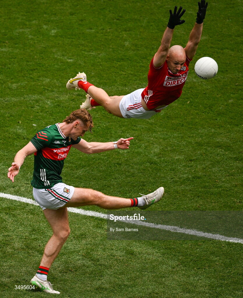 27 June 2026; Jack Carney of Mayo in action against Brian O'Driscoll of Cork during the GAA Football All-Ireland Senior Championship quarter-final match between Cork and Mayo at Croke Park in Dublin. Photo by Sam Barnes/Sportsfile