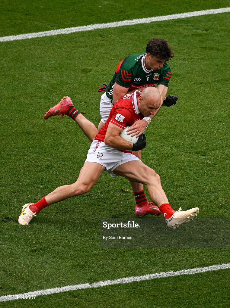27 June 2026; Brian O'Driscoll of Cork in action against Sam Callinan of Mayo during the GAA Football All-Ireland Senior Championship quarter-final match between Cork and Mayo at Croke Park in Dublin. Photo by Sam Barnes/Sportsfile
